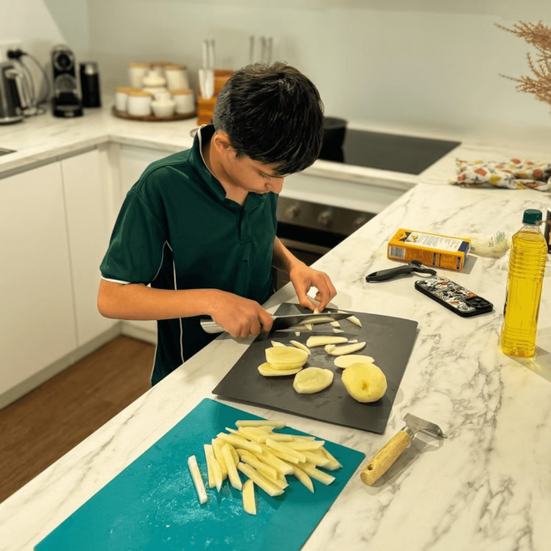 Vana Care participant building cooking skills at home