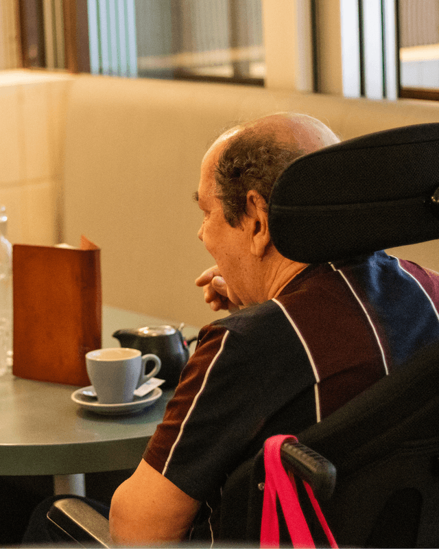 Vana Care participant at home with supported independent living